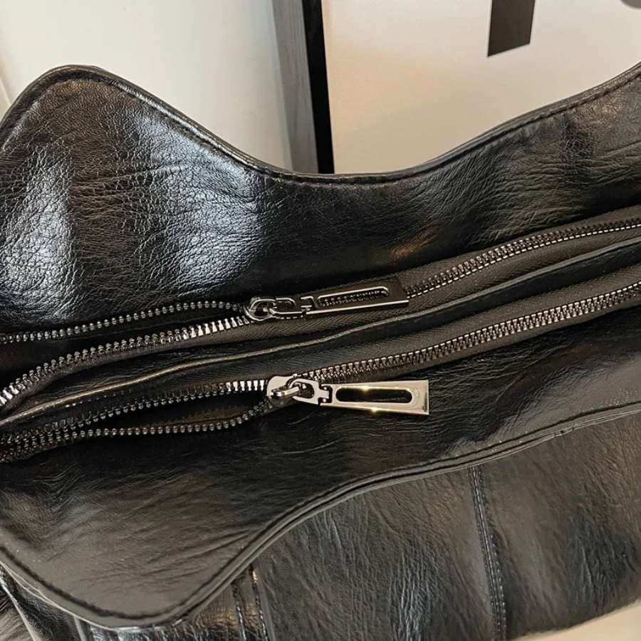 Uma Shoulder Bags
